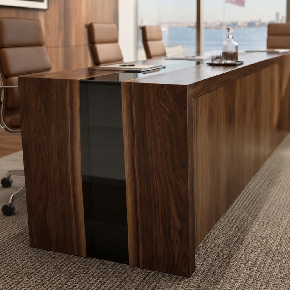 Massive custom live edge walnut table configured in a U-shape for high-capacity corporate conference installations