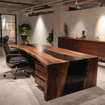 Custom black walnut epoxy river executive desk with waterfall base, live edge wood slab, black resin river, and luxury office furniture design