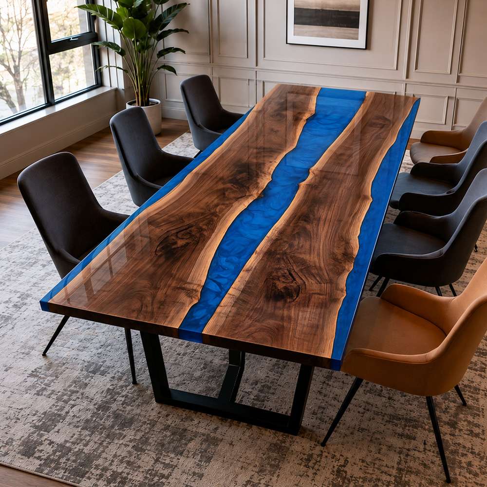 Custom black walnut dining table with vibrant blue epoxy resin river and natural live edge