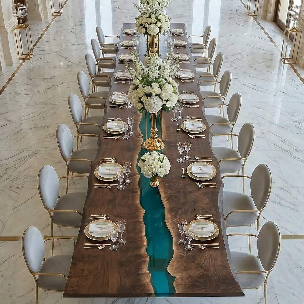 Black walnut banquet table featuring a clear epoxy river for weddings and luxury events
