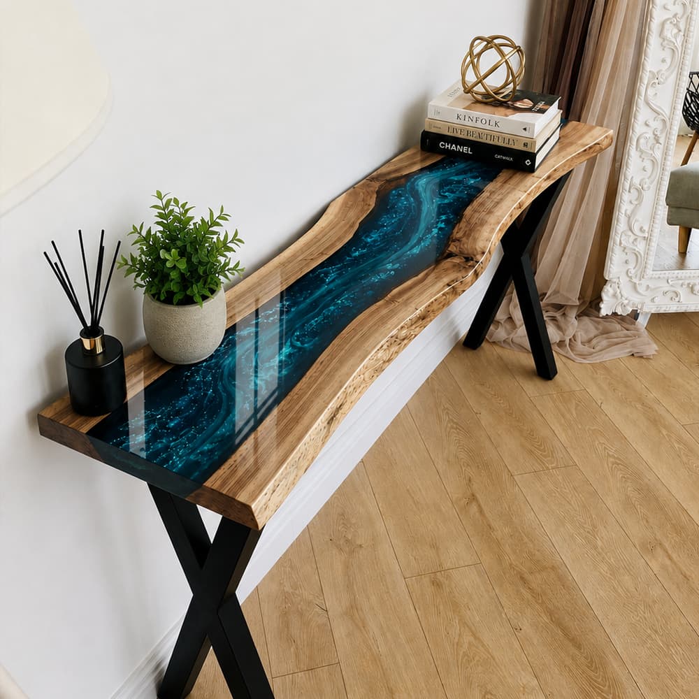 Live edge walnut console table with blue epoxy resin accent placed in a modern hallway