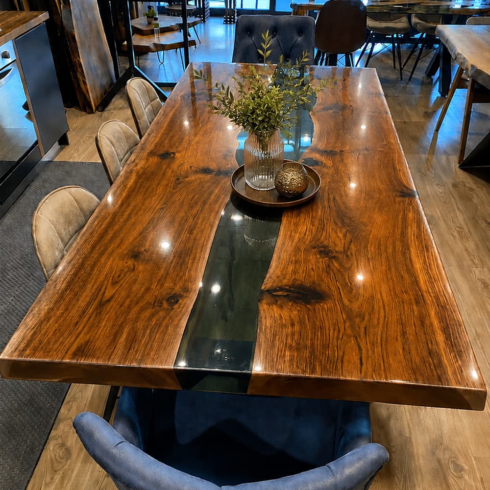 Custom black walnut epoxy dining table designed for contemporary interiors