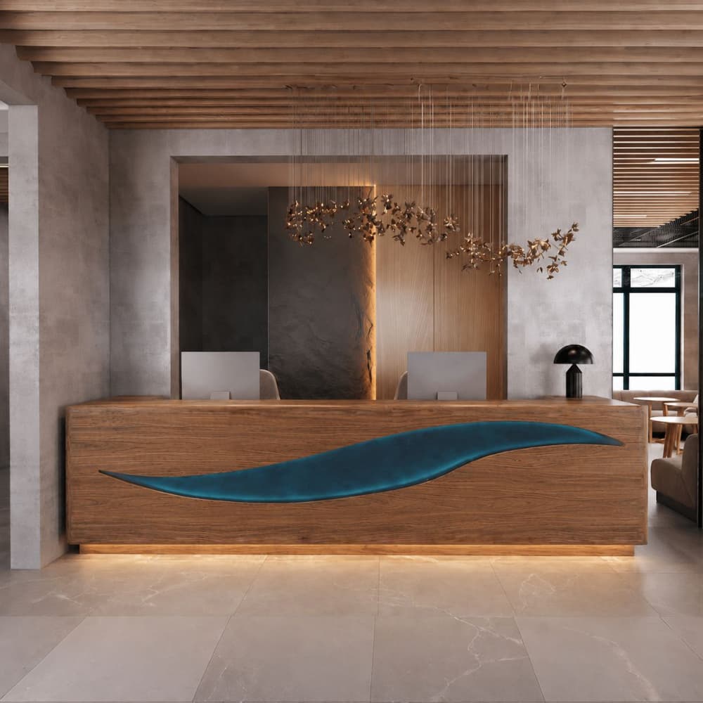 Front view of a long horizontal solid walnut wood reception desk embedded with a sleek, central wave-shaped translucent deep blue resin inlay