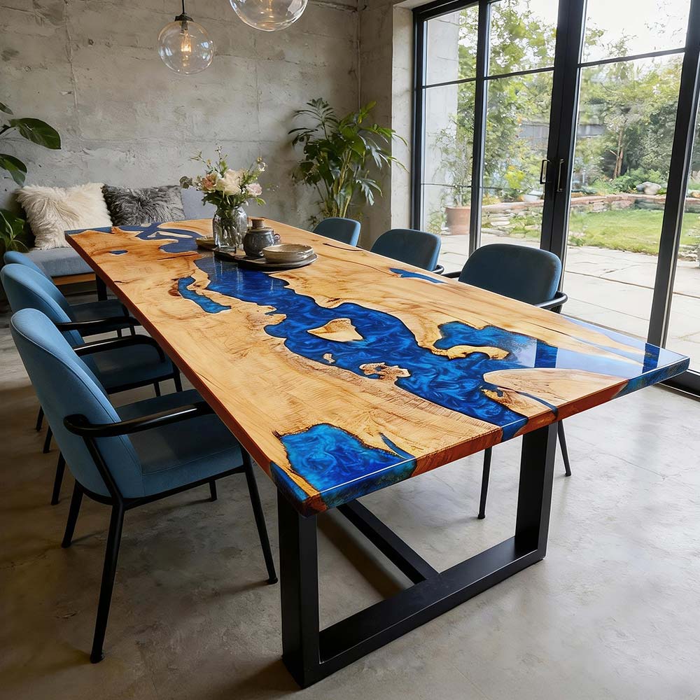 Luxury ash wood epoxy river table with flowing blue resin for modern dining interiors