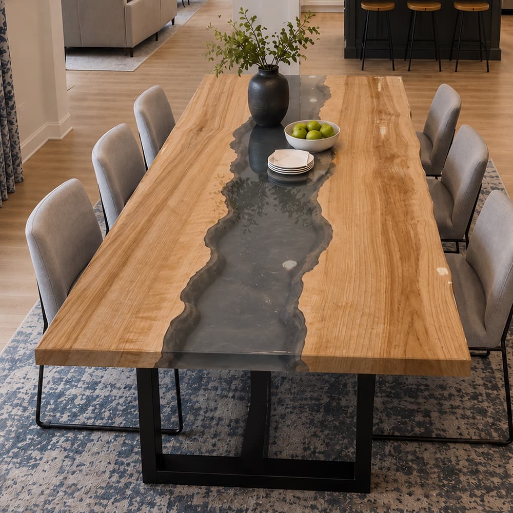 Aerial perspective of a sustainable rectangular ash wood tabletop showcasing flawless satin coating and an industrial black steel base