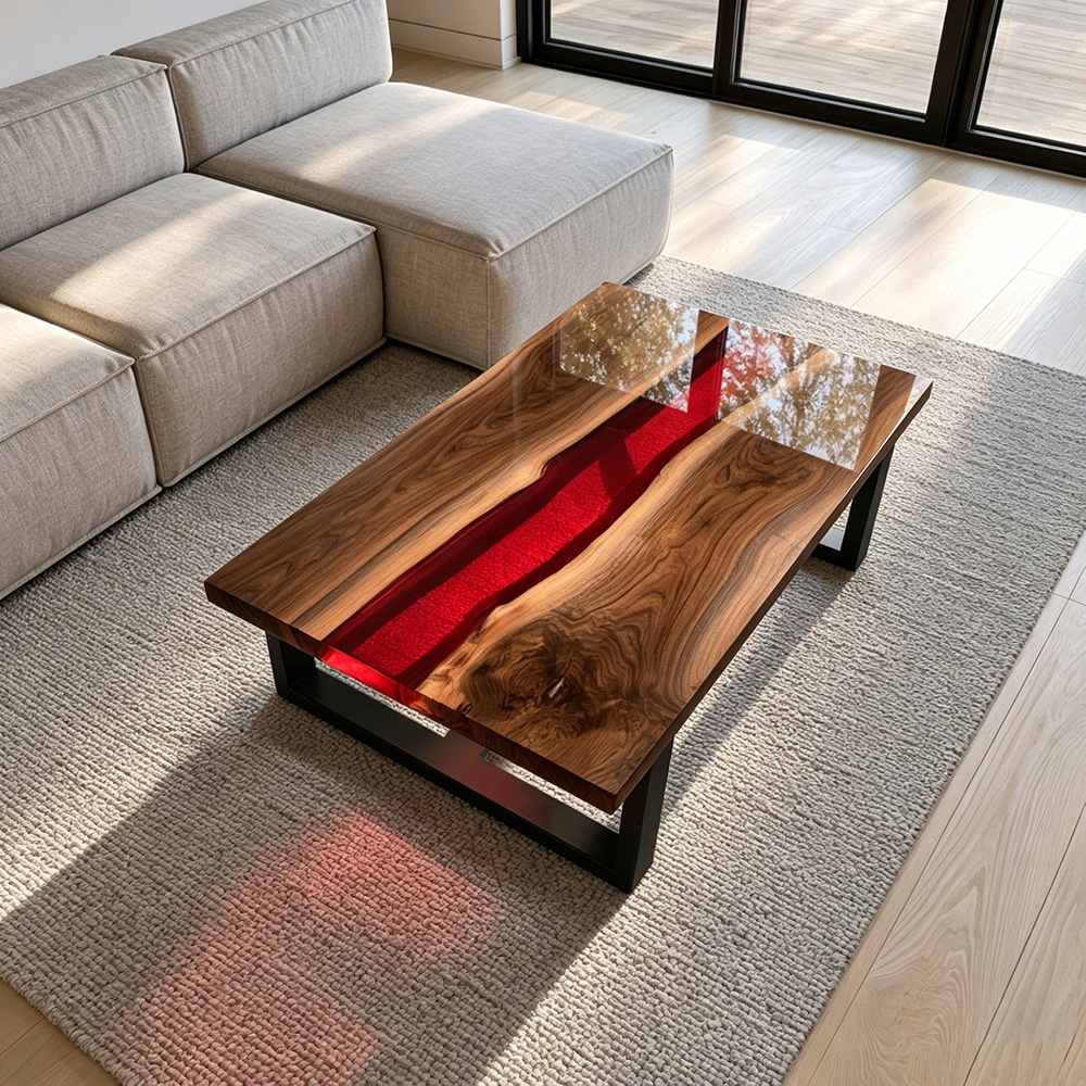 Minimalist square edge coffee table with transparent red resin suspended between richly figured walnut slabs