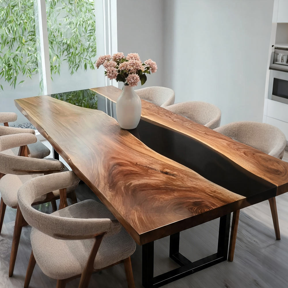 Styled neutral luxury dining vignette featuring live edge suar wood mirror black epoxy long dining table paired with soft cream curved fabric dining armchairs.