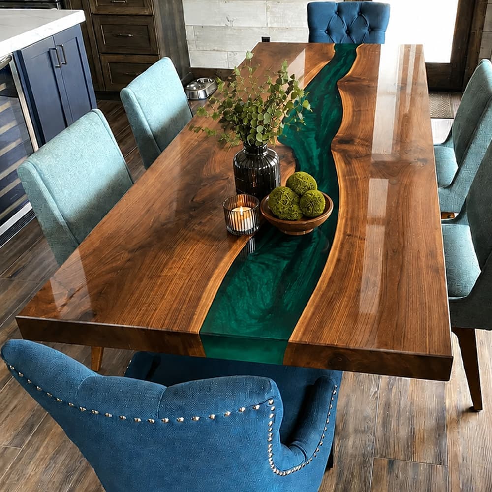 Close-up of figured black walnut grain and translucent green epoxy river