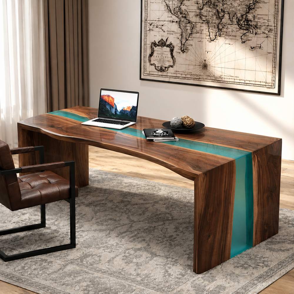 High-gloss transparent emerald green epoxy resin river reflecting soft window light on a live edge solid wood desk surface